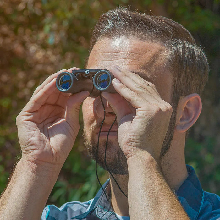 A Man Using the Barska 8x21mm Lucid View Compact Binoculars, 1st Gen - AB10108 Outdoors