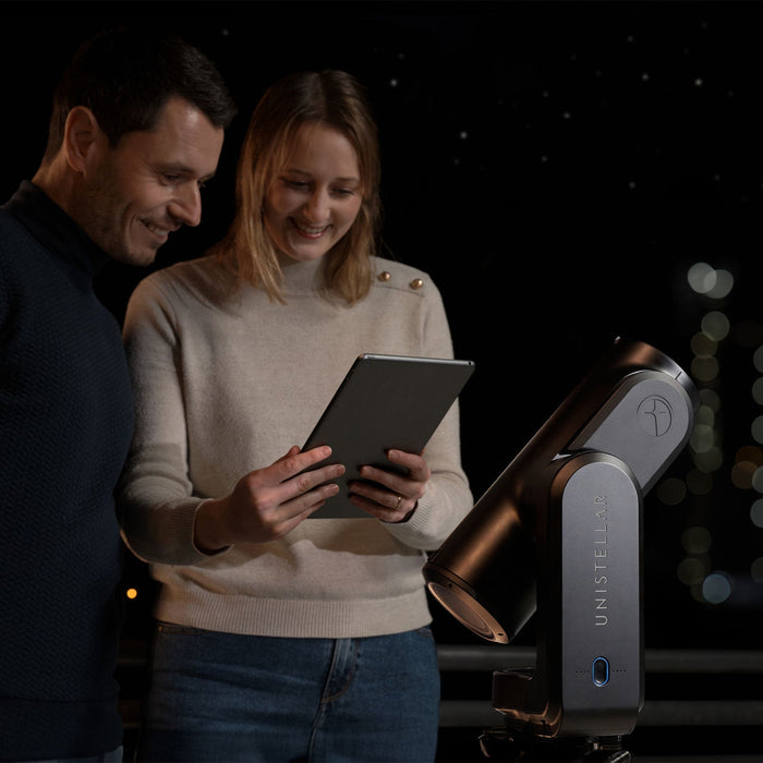 A Couple Using Unistellar Odyssey Pro Smart Telescope Eyepiece