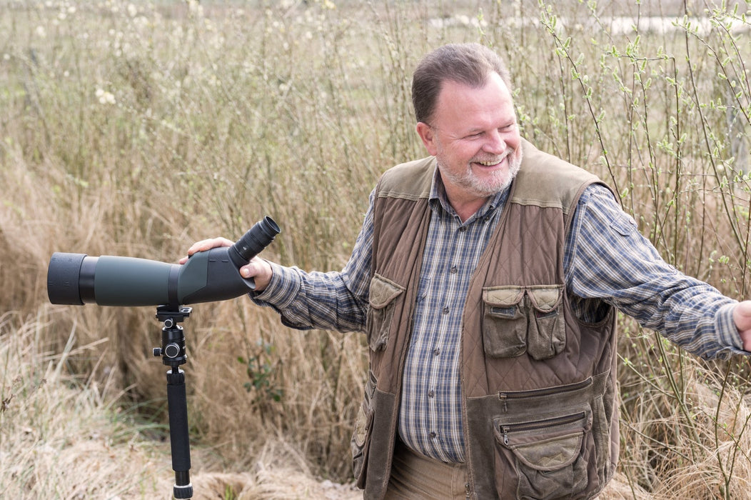 A Man Holding Bresser Pirsch 20-60x80mm 45° Angled Spotting Scope