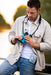 A Man Holding the Kite Optics 10x30mm APC Stabilized II Binoculars - Lifestyle Photo Outdoor