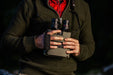A Man Holding the Kite Optics 22x50mm ED APC Stabilized Binoculars - Lifestyle Photo Outdoors