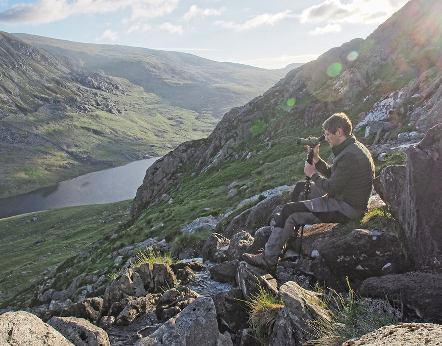 A Man Outdoor Using Kowa TSN-501 20-40x50mm Angled Spotting Scope