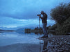 A Man Outdoor Using Kowa TSN-553 15-45x55mm Angled Spotting Scope
