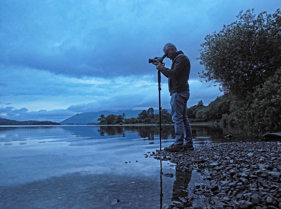 A Man Outdoor Using Kowa TSN-553 15-45x55mm Angled Spotting Scope