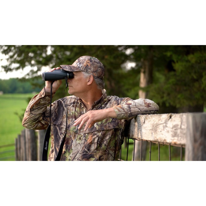 A Man Using Alpen Teton 8x42mm Binoculars with Abbe Prism Outdoors