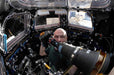 A Man Using the DayStar Camera Quark Adapter for Canon SLR in Space