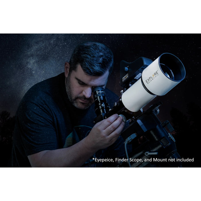 A Man Using the Explore Scientific ED80 Essential Series Air-Spaced Triplet Refractor Telescope with 0.8x Focal Reducer and iEXOS-100-2 PMC-Eight Equatorial Tracker System with WiFi and Bluetooth®