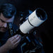A Man Using the Explore Scientific ED80 Triplet Refractor with Field Flattener - Astronomer Using ED80 Refractor Telescope at Night