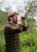 A Man Using the Kite Optics 10x30mm LYNX HD+ Binoculars- Lifestyle Photo Outdoors