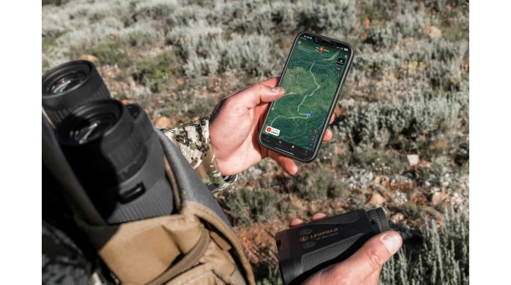 A Man Using the Leupold RX-5000 TBR/W Rangefinder with Mobile Outdoors