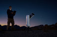 A Man Using the Vaonis Vespera II Smart Telescope for Astrophotography
