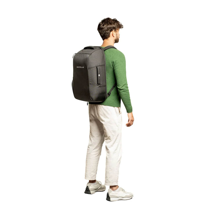 A Man Wearing the Unistellar Backpack for Odyssey Pro and Odyssey