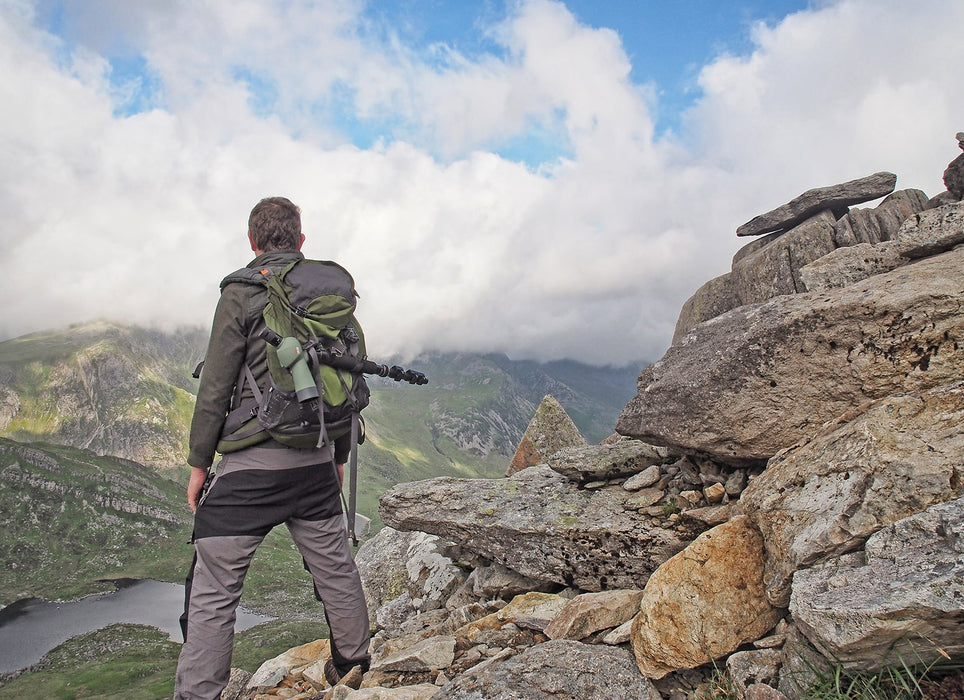 A Man with Kowa TSN-502 20-40x50mm Straight Spotting Scope Outdoors