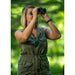A Woman Using Alpen Wings 8x34mm Binoculars Outdoors