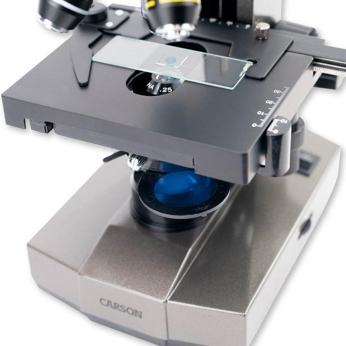 A Woman Using Carson Intermediate 100x-1000x LED Compound Microscope with Mechanical Stage Slide and Built-in Filter Holder