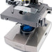 A Woman Using Carson Intermediate 100x-1000x LED Compound Microscope with Mechanical Stage Slide and Built-in Filter Holder