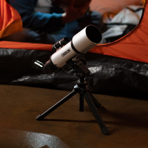 Carson SkyChaser™ 133.5x70mm Refractor Telescope with Tabletop Tripod Lifestyle Photo
