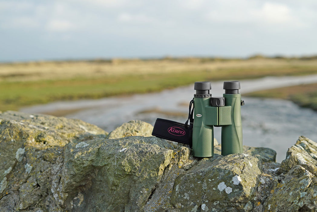 Kowa SV II 10x42mm Roof Prism Binocular Standing on a Rock Outdoors