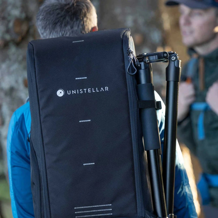 Man Wearing the Unistellar eVscope eQuinox and Backpack Smart Digital Reflector Telescope