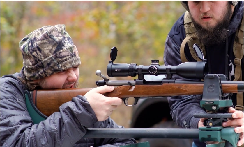 Men Using Alpen Apex 4.5-27x50mm Riflescope Outdoors