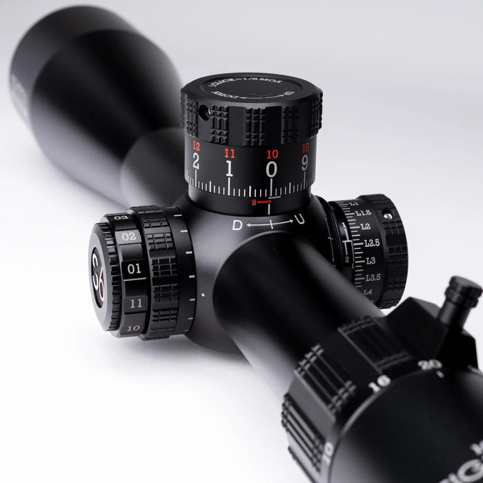 Sightron S6 10-60x56mm ED MOA-BD Bench Rest Riflescope - Angled Close-Up of Elevation and Windage Adjustment Turrets