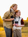 Women Holding the Kite Optics 10x30mm APC Stabilized II Binoculars - Lifestyle Photo Outdoor