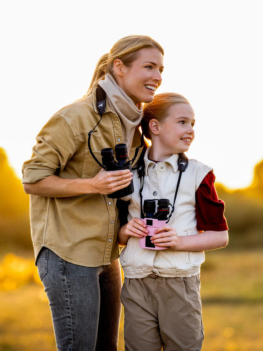 Women Holding the Kite Optics 14x30mm APC Stabilized II Binoculars - Lifestyle Photo Outdoor